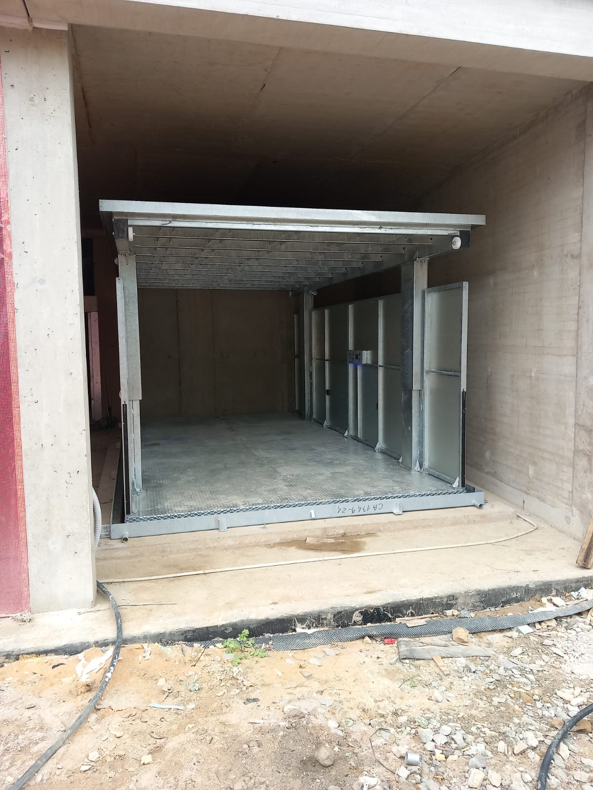 MONTAUTO_CARLIFT_ARIES_5_INSTALLAZIONE_ALLINTERNO_INDOOR_INSTALLATION_CMC_PARKLIFT-585x780
