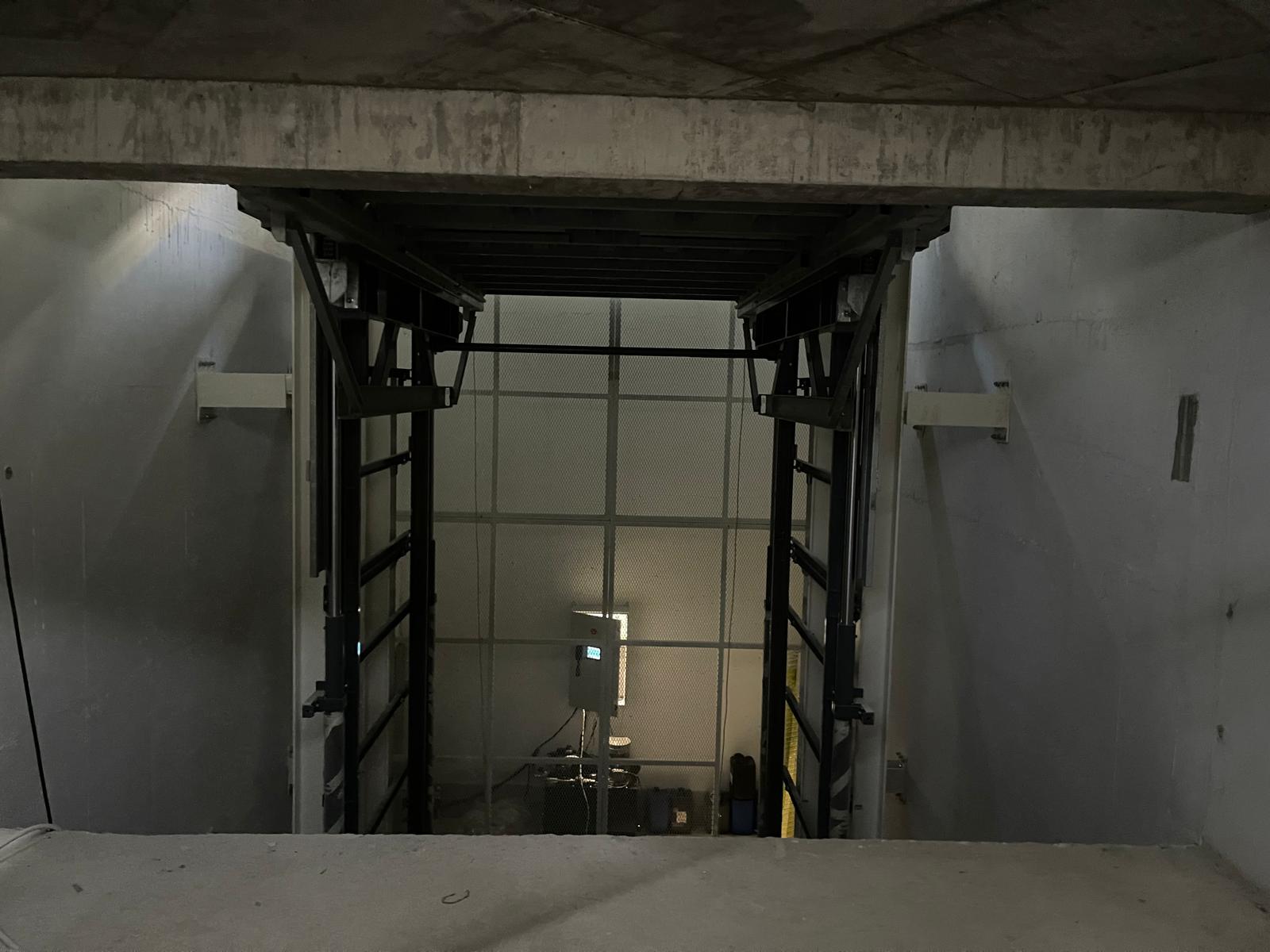 MONTAUTO_CARLIFT_SAGITTA_S_FISSAGGIO_ALLE_TRAVI_FIXING_TO_BEAMS_CMC_PARKLIFT-780x585