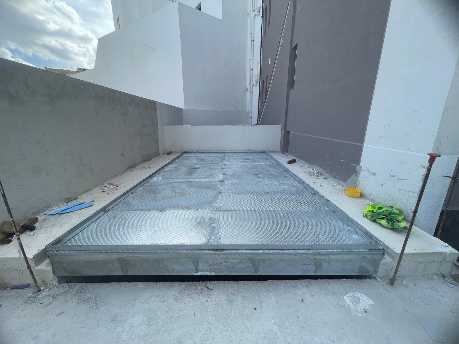MONTAUTO_CARLIFT_SAGITTA_S_TETTO_DA_PAVIMENTARE_ROOF_WAITING_TO_BE_PAVED_CMC_PARKLIFT-780x585