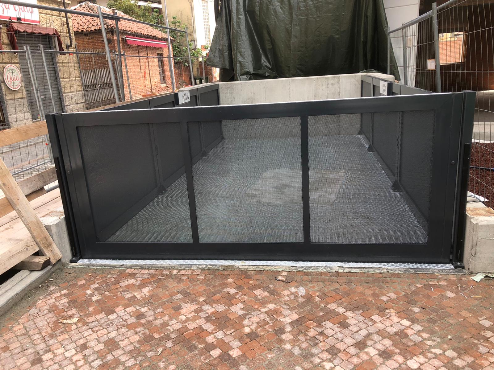 MONTAUTO_CARLIFT_VELA_LIGHT_CANCELLO_A_GHIGLIOTTINA_GUILLOTINE_GATE_CMC_PARKLIFT-780x585