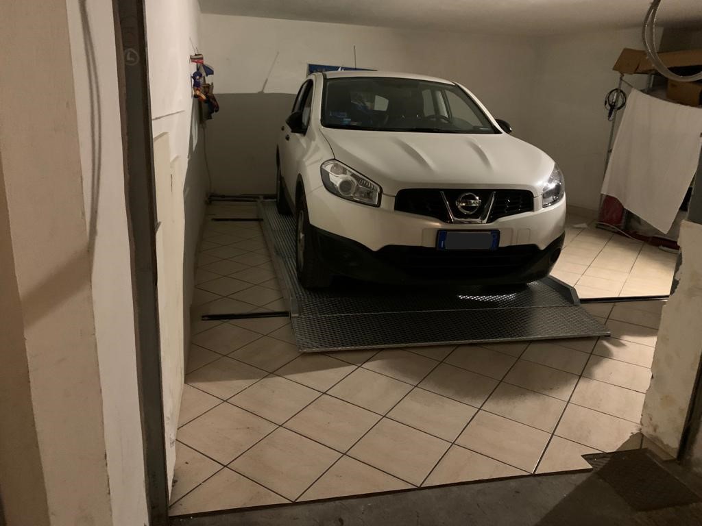 PARMA_ITALIA_2_NORMA_MODELLO_T1_PEDANA_TRASLANTE_SLIDING_PLATFORM_CMC_PARKLIFT