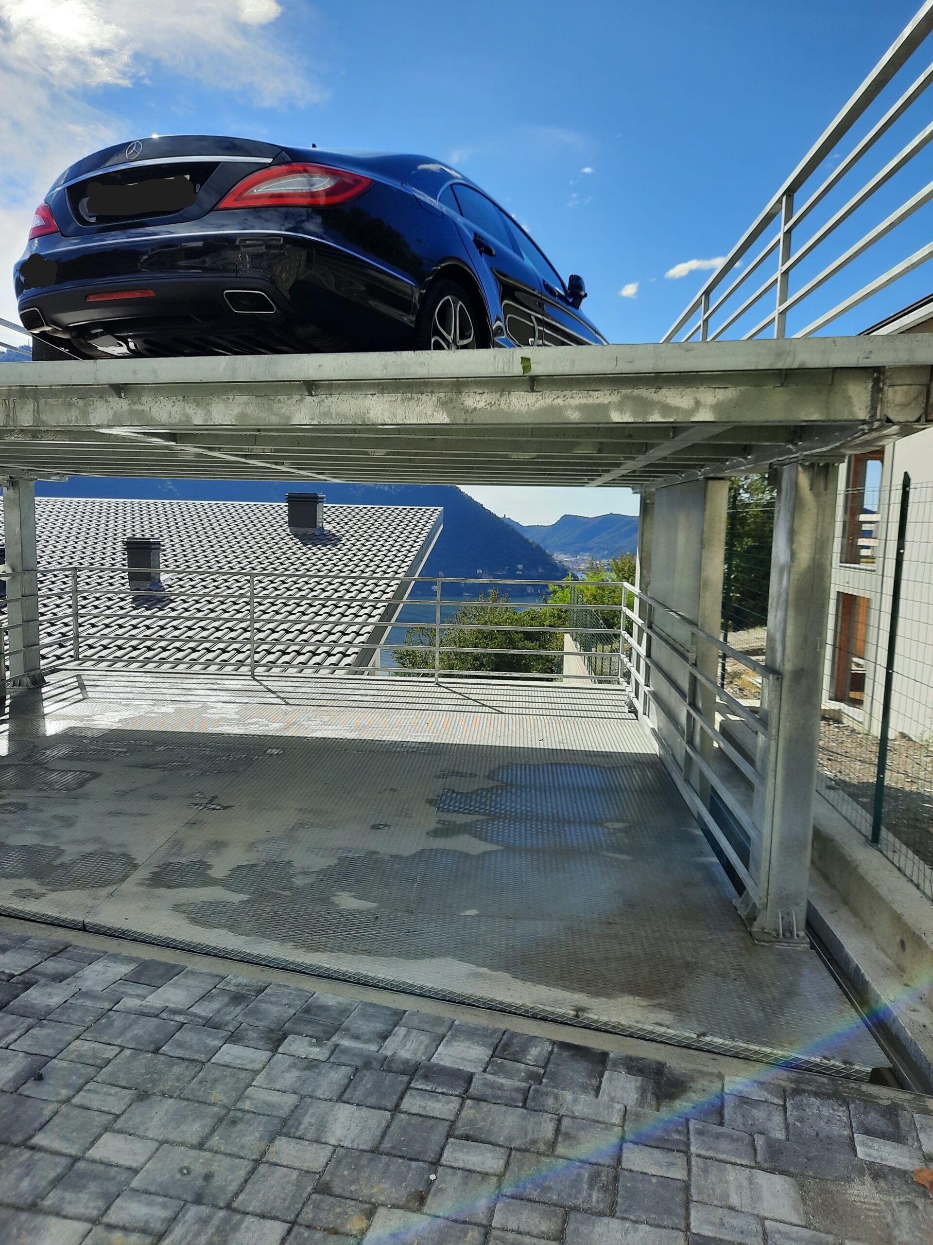 RICOVERO_AUTO_CAR_SHELTER_HYDRUS_4_POSTI_AUTO_PARKING_SPACES_CMC_PARKLIFT-585x780
